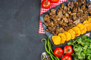 Halal chicken strips, mince and topside strips cooking fast in a pan for a quick half-term dinner
